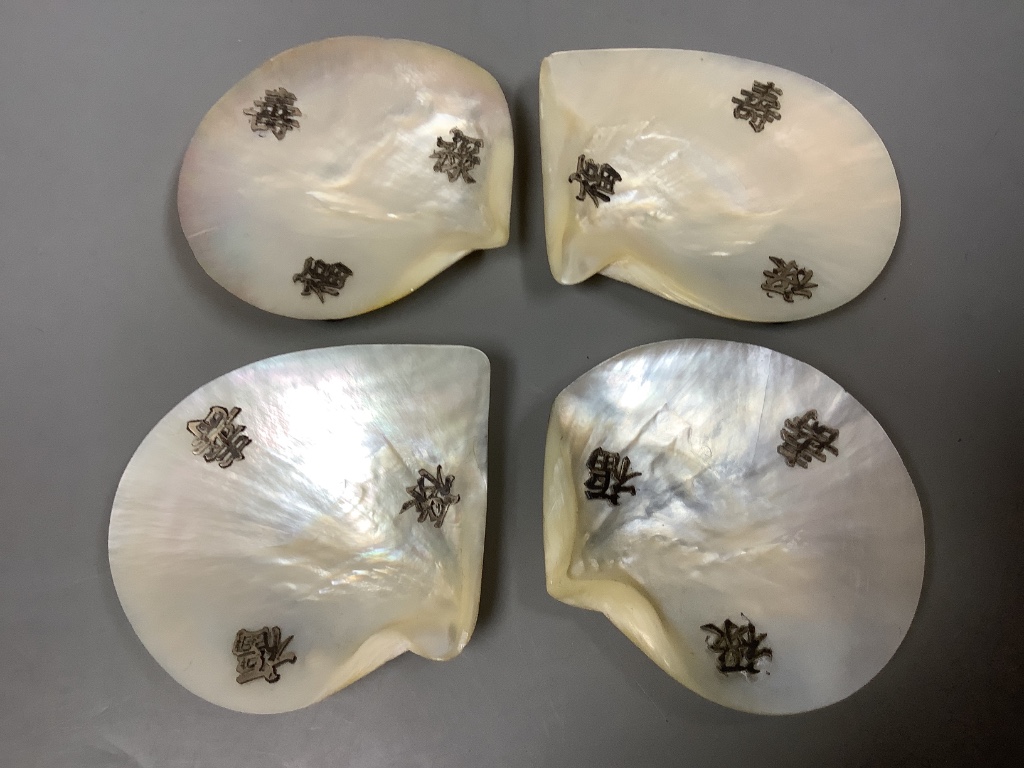 A set of four Chinese mother of pearl dishes, approx. length 11.5cm